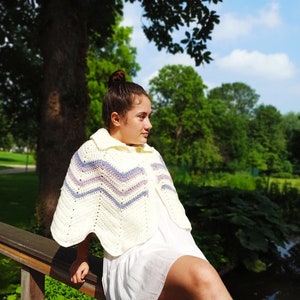 a hand-knitted white pelerine cape with a collar crocheted coat knitted cape on shoulders image 1
