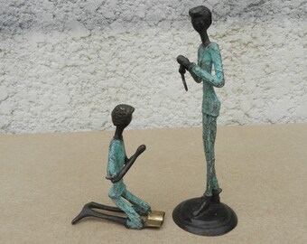 Boy on knees in prayer clasped hand bronze blue oxidized patina, sculpted Bible and cross carved bronze, Burkina Faso gift baptism communion