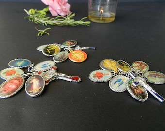 Lot of Saint Joseph medals, Jesus crucifix, divine mercy Faustina, Padre Pio, Michael the Archangel, Magdala, Virgin Mary, Antoine Padua