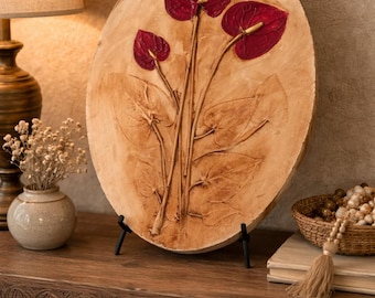 Handgemaakte wanddecoratie met botanisch reliëf