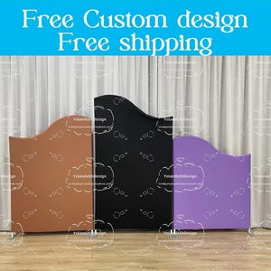 May include: Three free-standing backdrop panels in different colors: brown, black, and purple. Each panel has a curved top edge and a flat bottom edge. The panels are standing on a wooden floor. The text "Free Custom design Free shipping" is displayed at the top of the image.