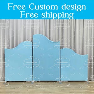 May include: Three light blue, wavy, freestanding backdrop panels with silver metal stands. The panels are made of foam board and are designed to be used as a backdrop for photos or videos. Free custom design and free shipping.