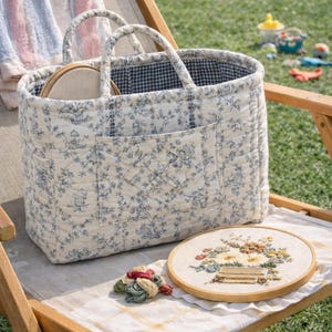 May include: A trio of ceramic mugs with a speckled, matte finish in cream, light grey, and dark grey. Each mug has a simple, modern design and a rounded handle. Suitable for tea or coffee, these mugs offer a minimalist aesthetic.