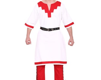 May include: A white tunic with red trim and a brown belt. The tunic has a V-neck and short sleeves. The person is wearing red pants with black laces and brown boots.