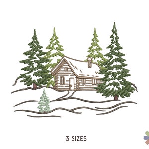 Könnte beinhalten: Stickerei mit einem Häuschen im Wald mit schneebedeckten Bäumen. Das Häuschen hat eine braune Holzfassade und ein weißes Dach. Die Bäume sind grün und haben weißen Schnee auf ihren Ästen. Das Design ist perfekt für winterliche Bastelarbeiten.