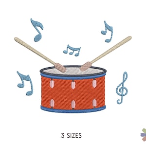 May include: A red and blue drum with two wooden drumsticks and musical notes around it. The drum has a blue rim and a red body with white accents. The musical notes are blue and white.