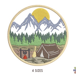 May include: Embroidered patch depicting a mountain scene with a yellow sun, green trees, a brown tent, and a red campfire. The patch is circular and has a beige border.