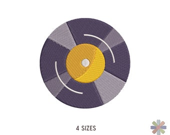 May include: A purple and gray vinyl record with a yellow center. The record has a white line design.