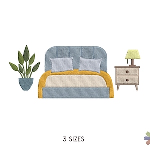 May include: A blue upholstered bed with a yellow bedspread and two white pillows. A small wooden nightstand with two drawers and a lamp with a yellow shade is next to the bed. A green potted plant is on the left side of the bed.