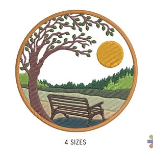 May include: Embroidered design of a circular landscape scene with a brown tree, a yellow sun, green trees, and a brown wooden bench. The design is perfect for embroidery projects.