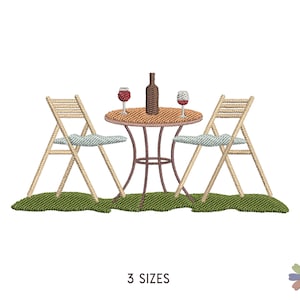 May include: A table with two chairs and a bottle of wine and two glasses of wine. The table and chairs are on a green lawn.