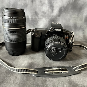 Canon EOS Rebel S film camera 2 lenses, 35-105mm and  zoom ultrasonic 75-300mm