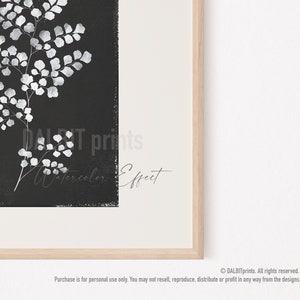 May include: A black and white print of a fern with a watercolor effect. The print has the text "DALT prints Watercolor Effect" at the bottom.