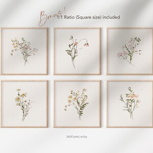 May include: Six framed watercolor prints of different floral arrangements. Each print features a bouquet of delicate flowers in shades of pink, yellow, and white, with green stems and leaves. The prints are arranged in a grid pattern on a white background.
