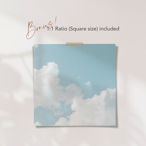 May include: A light blue sky with white clouds. The image is framed with a white border and a piece of tape at the top. The text "Bonus! 1:1 Ratio (Square size) included" is written in brown text at the top of the image.