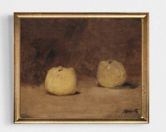 May include: A framed painting of a still life with two yellow apples on a brown background. The artist's signature is visible in the bottom right corner.