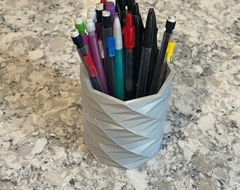 Schreibtisch-Organizer für Kugelschreiber, Bleistifte und Marker – modernes Spiraldesign. 13 Farben verfügbar