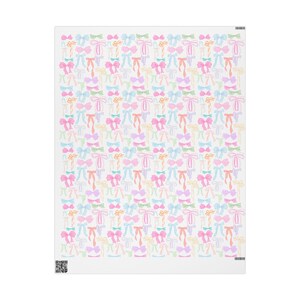 May include: A white background with a repeating pattern of colorful bows. The bows are in various shades of pink, blue, yellow, and green.