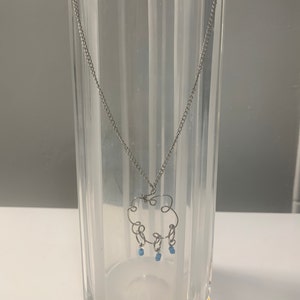 Rain cloud necklace with raindrops