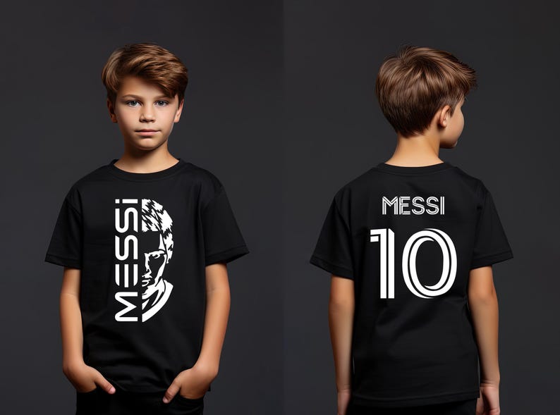 a young boy wearing a black messi shirt