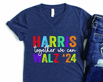 May include: A navy blue v-neck t-shirt with the text "HARRIS together we can WALZ '24" in rainbow colors.