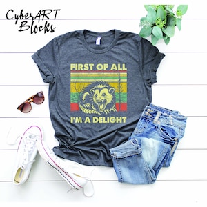a t - shirt that says first of all i'm a delight