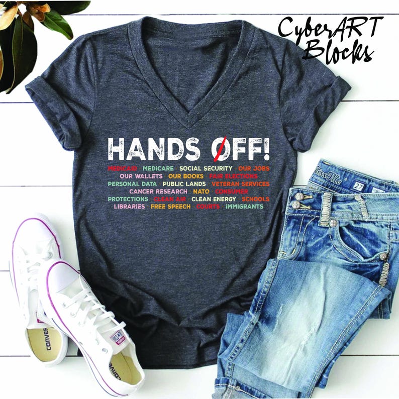 a t - shirt that says hands off on it