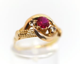 14kt – 585 ladies yellow gold ring synthetic ruby + rock crystal cord decoration, Rg: 57