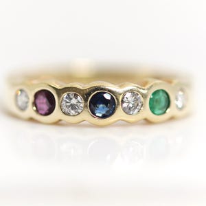 585 14kt yellow gold alliance ring with brilliant-cut diamond, sapphire, ruby, and emerald, size 54