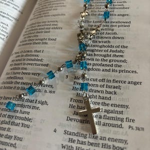 Beaded cross Bible book mark