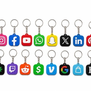 May include: A collection of twenty square keychains featuring various social media and technology brand logos in vibrant colors. Each keychain is attached to a silver metal split ring by a short chain, displaying icons like TikTok, Instagram, Facebook, YouTube, WhatsApp, Snapchat, X, LinkedIn, Pinterest, Telegram, Spotify, Twitch, Reddit, and others.
