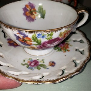 Vintage Porcelain Gold Trimmed Teacup and Scalloped Edged Saucer set