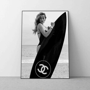 Custom decorative surfboard wall art. #chanel #chanelsurfboard
