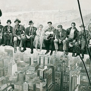 May include: Black and white artwork depicting iconic figures, including Marilyn Monroe, Elvis Presley, and King Kong, seated on a steel beam high above a cityscape. The image is a creative and artistic representation of famous personalities.