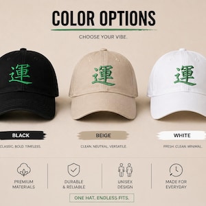 May include: Three baseball caps in black, beige, and white, each embroidered with a green character. The image includes text that says "COLOR OPTIONS" and "CHOOSE YOUR VIBE."