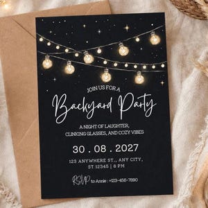 May include: Black invitation card with string lights and the words "Backyard Party" in white script. The card includes the date, time, and location, along with a RSVP contact. The invitation is placed inside a brown envelope.