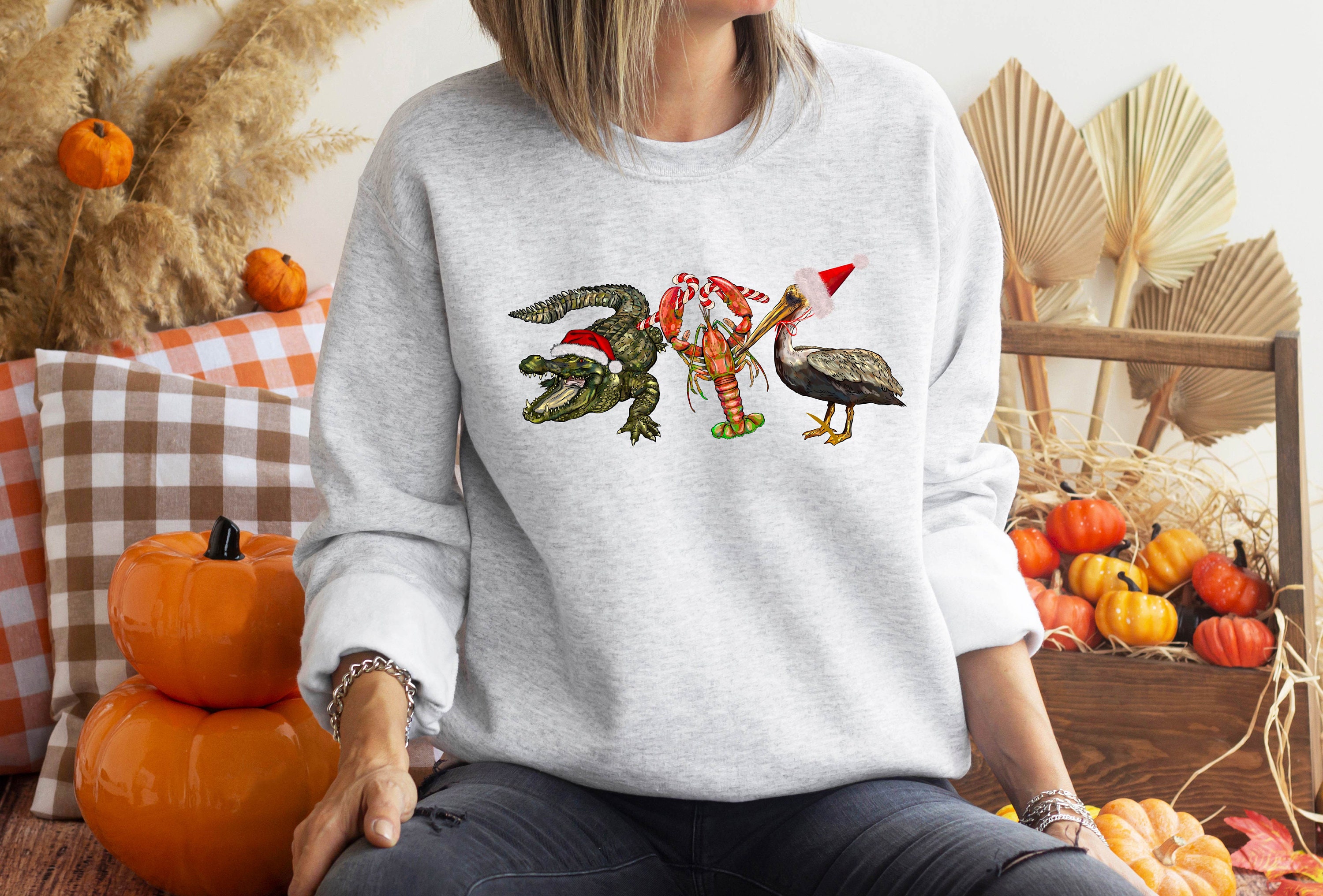 Discover Cajun Christmas Sweatshirt, Christmas Alligator Pelican Crawfish