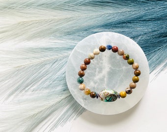 Lighthouse in the Storm Bracelet > natural crystal healing jewelry ocean jasper abalone sodalite charoite elastic stretch