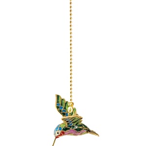 May include: A gold chain with a green, blue, pink, and red enamel hummingbird ornament. The hummingbird is in flight with its wings spread.