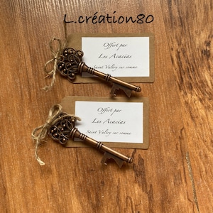 Bottle opener keys with personalized label