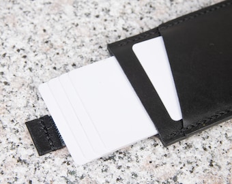 Cartera de piel australiana artesanal con tirador - Diseño minimalista