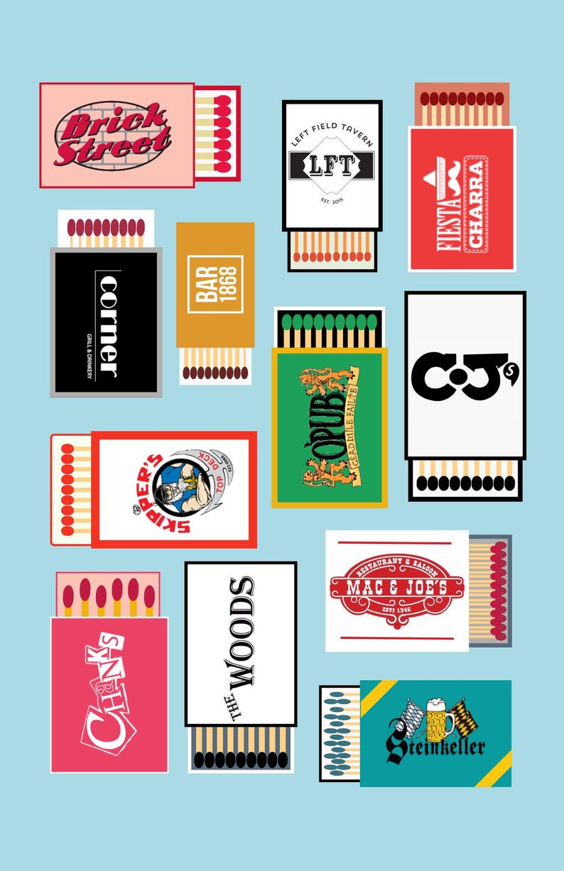 May include: A collection of matchboxes with various logos and text, including "Brick Street," "Left Field Tavern," "Fiesta Charra," "Corner," "Bar 1868," "Skipper's," "The Woods," "Mac & Joe's," and "Steinkeller." The matchboxes are set against a light blue background.
