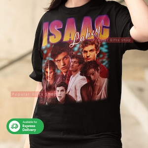 Peut inclure: T-shirt noir avec un graphique vintage d'un groupe appelé "Isaac Lahey". Le graphique représente cinq jeunes hommes sur un fond coloré.