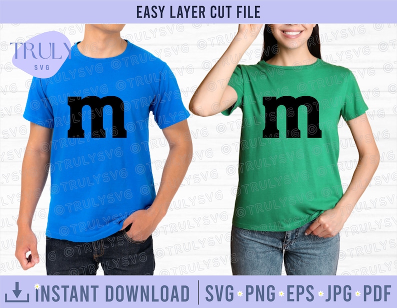 May include: Two t-shirts with a large black letter "M" on the front. The shirt on the left is blue and the shirt on the right is green.