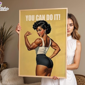 May include: A framed poster featuring a vintage-style illustration of a muscular person flexing their arm, wearing a white tank top and black shorts. The text YOU CAN DO IT! is printed in white at the top against a solid mustard yellow background.