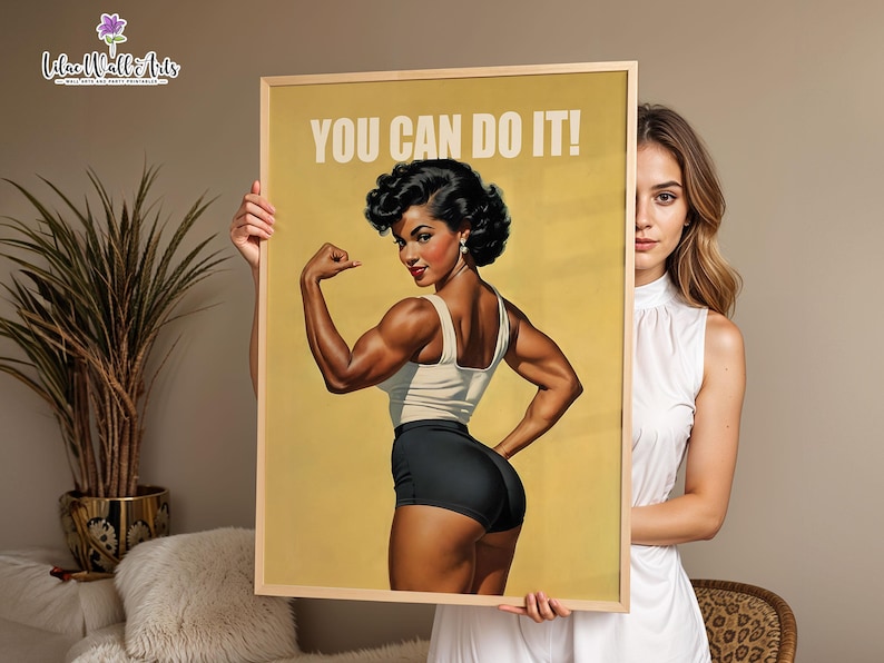 May include: A framed poster featuring a vintage-style illustration of a muscular person flexing their arm, wearing a white tank top and black shorts. The text YOU CAN DO IT! is printed in white at the top against a solid mustard yellow background.
