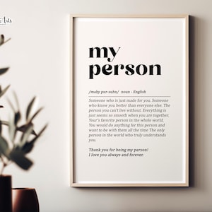 May include: A black and white printable wall art print with the word "my person" defined as "Someone who is just made for you." The print also includes the text "Thank you for being my person! I love you always and forever."