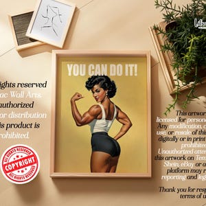 May include: A framed poster featuring a vintage-style illustration of a muscular person flexing their arm with the text YOU CAN DO IT! at the top. The person wears a white tank top and black shorts against a solid yellow background.