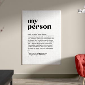 May include: A black and white printable wall art print with the word "my person" defined as "Someone who is just made for you." The print is on a white background with a textured look.