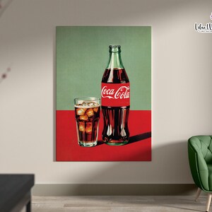 May include: A vintage-style illustration of a Coca-Cola bottle and a glass of ice-cold Coca-Cola. The bottle is red and white with the Coca-Cola logo. The glass is filled with ice and a dark brown liquid. The background is a green and red color.